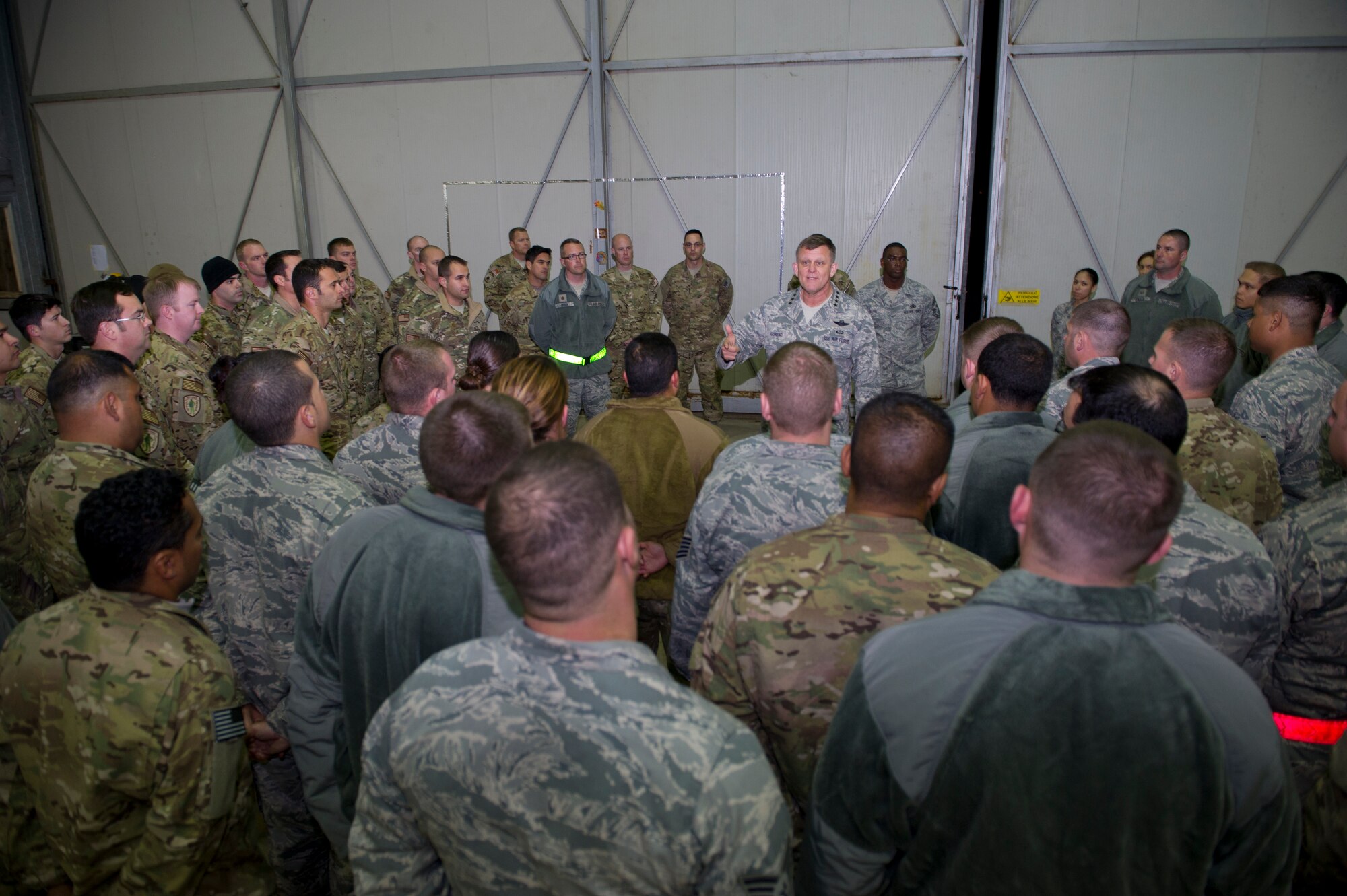 General Frank Gorenc, U.S. Air Forces in Europe and Air Forces Africa commander, addresses Airmen deployed to Southern Italy during an all call Dec. 16, 2013. The general and Chief Master Sgt. James Davis, USAFE-AFAFRICA command chief, traveled to Africa to visit Airmen supporting the U.S. Africa Command mission and to address current issues affecting Airmen. (U.S. Air Force photo/Tech. Sgt. Benjamin Wilson)