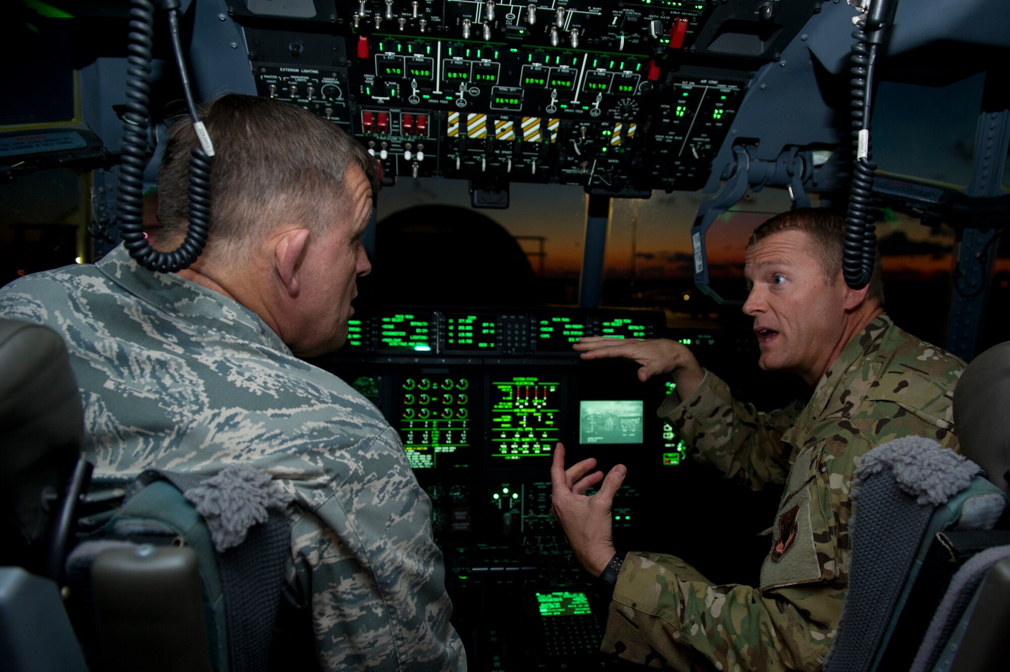 Lt. Col Stephen Moyes, 563rd Air Expeditionary Group commander, briefs General Frank Gorenc, U.S. Air Forces in Europe and Air Forces Africa commander, on the capabilities of the HC-130J Combat King II deployed to Southern Italy Dec. 16, 2013. The general and Chief Master Sgt. James Davis, USAFE-AFAFRICA command chief, traveled to Italy and Africa to visit Airmen supporting the U.S. Africa Command mission and to address current issues affecting Airmen. (U.S. Air Force photo/Tech. Sgt. Benjamin Wilson)