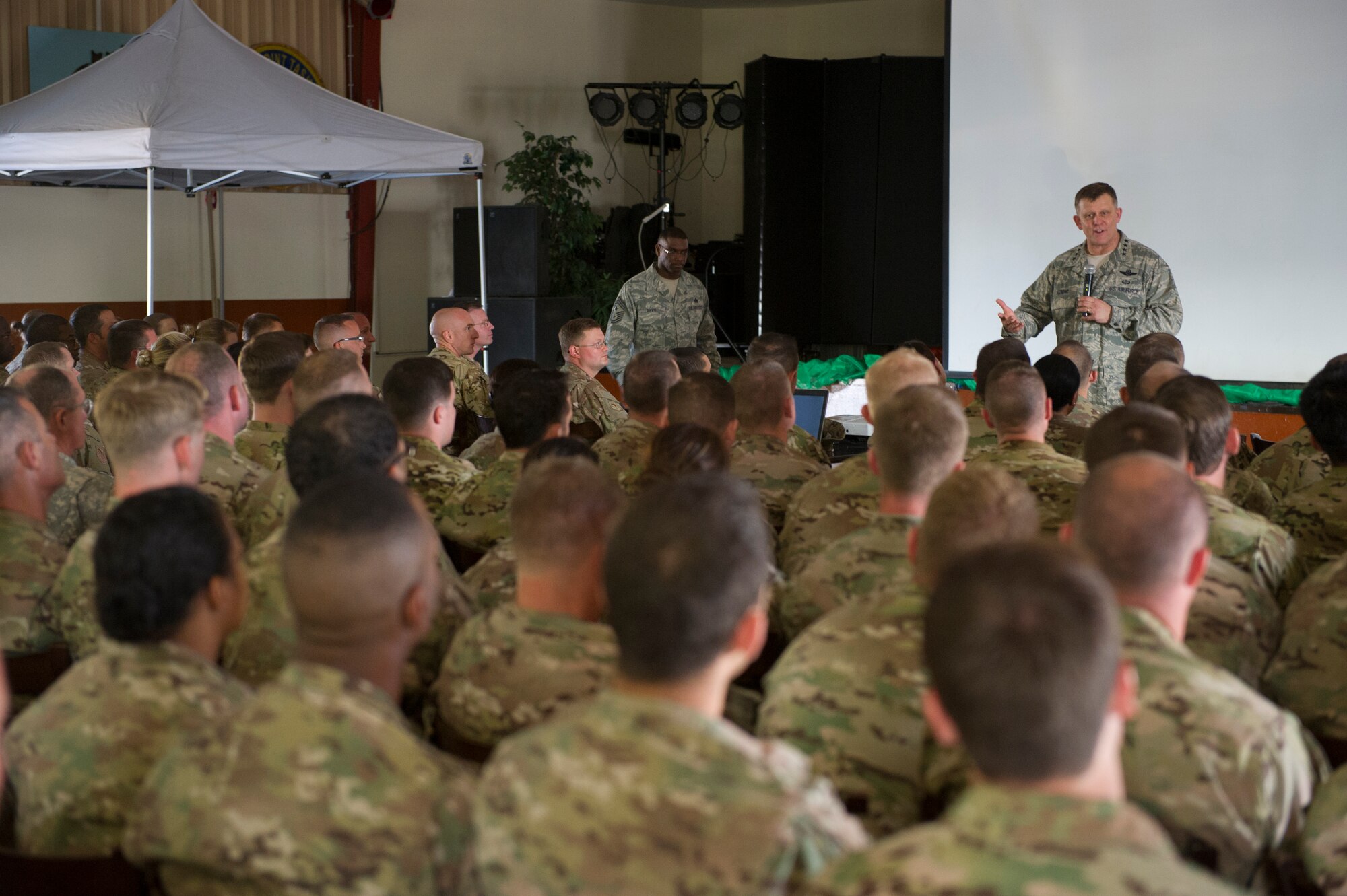General Frank Gorenc, U.S. Air Forces in Europe and Air Forces Africa commander, addresses Airmen deployed to Camp Lemonier, Djibouti, during an all call Dec. 14, 2013. The general and Chief Master Sgt. James Davis, USAFE-AFAFRICA command chief, traveled to Africa to visit Airmen supporting the U.S. Africa Command mission and to address current issues affecting Airmen. (U.S. Air Force photo/Tech. Sgt. Benjamin Wilson)