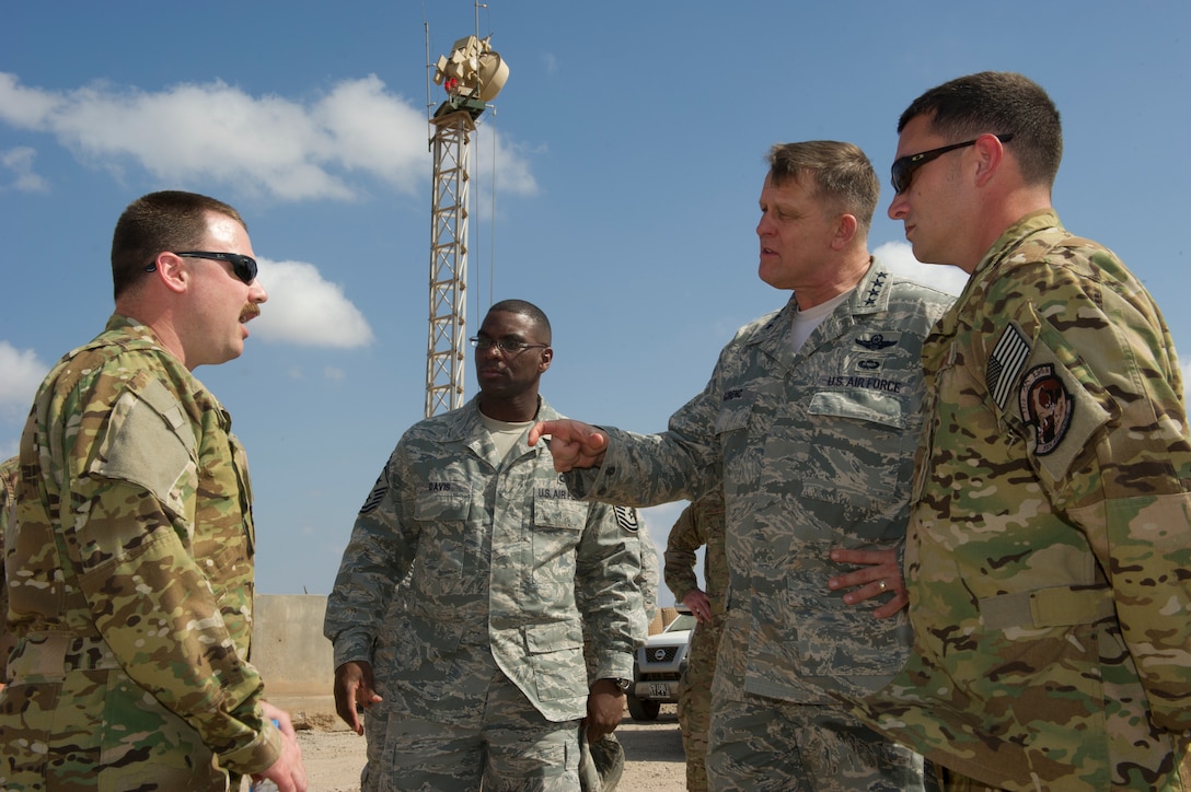 General Frank Gorenc, U.S. Air Forces in Europe and Air Forces Africa commander (right), and Chief Master Sgt. James Davis, USAFE-AFAFRICA command chief, speak with Airmen deployed to Camp Lemonier, Djibouti, Dec. 14, 2013. The general and chief traveled to Africa to visit Airmen supporting the U.S. Africa Command mission and to address current issues affecting Airmen. (U.S. Air Force photo/Tech. Sgt. Benjamin Wilson)