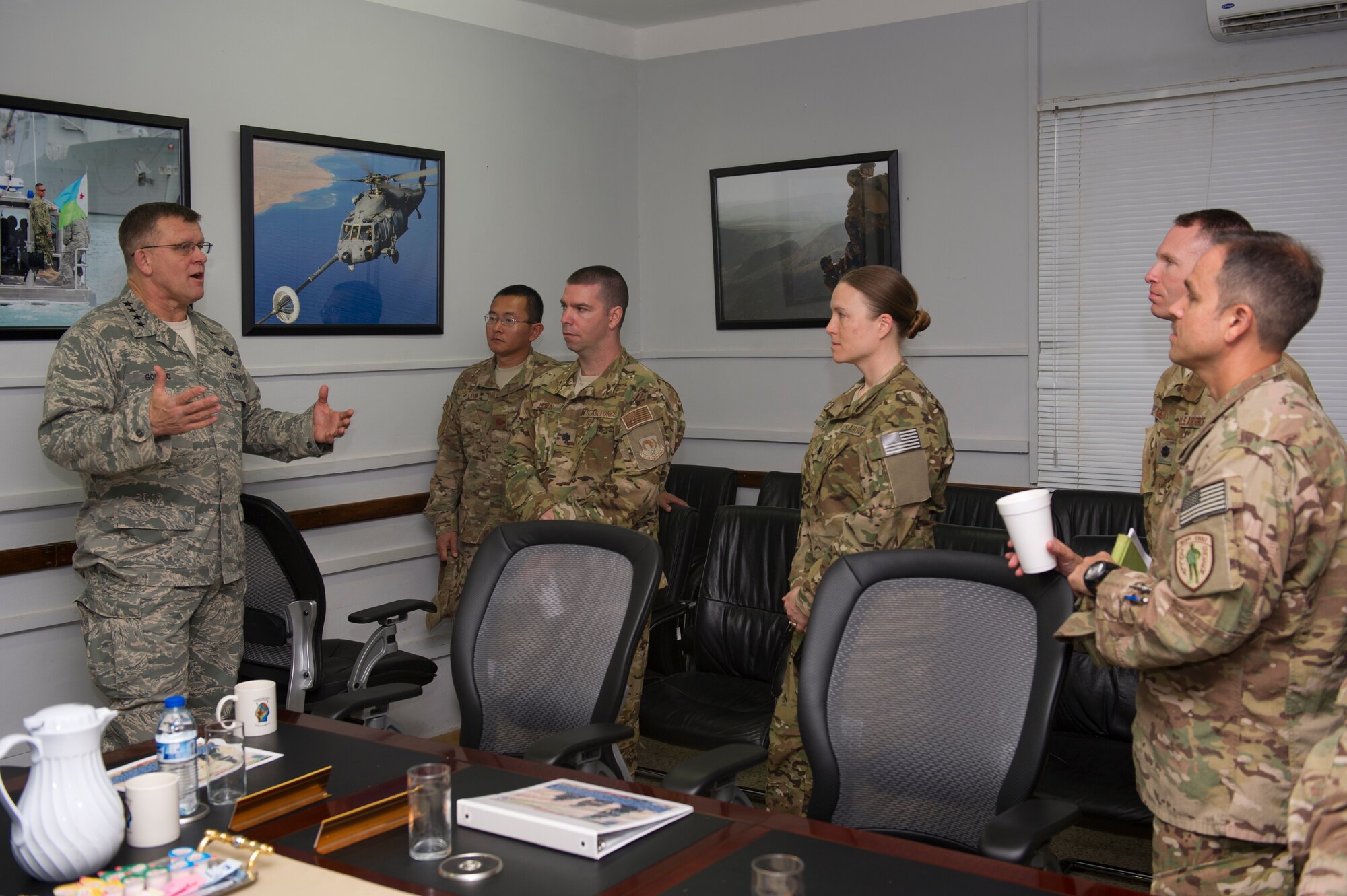 General Frank Gorenc, U.S. Air Forces in Europe and Air Forces Africa commander, speaks with the leadership of the 449th Air Expeditionary Group at Camp Lemonier, Djibouti, Dec. 14, 2013. The general and Chief Master Sgt. James Davis, USAFE-AFAFRICA command chief, traveled to Africa to visit Airmen supporting the U.S. Africa Command mission and to address current issues affecting Airmen. (U.S. Air Force photo/Tech. Sgt. Benjamin Wilson)