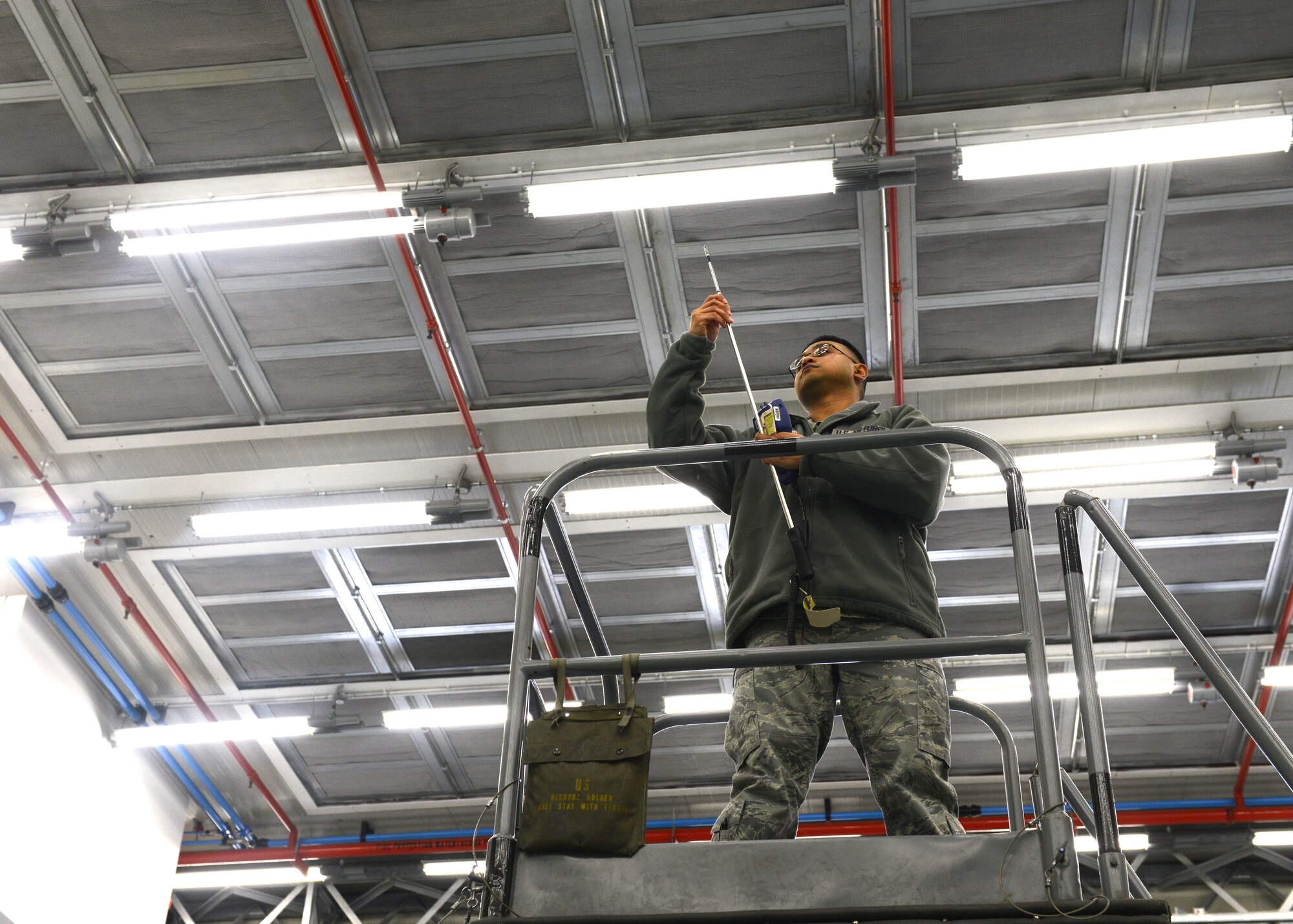 Staff Sgt. Paolo Melendez, 31st Aerospace Medicine Squadron bioenvironmental engineering radiation protection safety manager, tests a ventilation systems quality, Dec. 17, 2013, at Aviano Air Base, Italy. At bioenvironmental engineering, Airmen take measures to prevent four different base-hazard elements: Industrial hygiene, radiation protection, environmental protection and occupational health. (U.S. Air Force photo/Airman Ryan Conroy) 