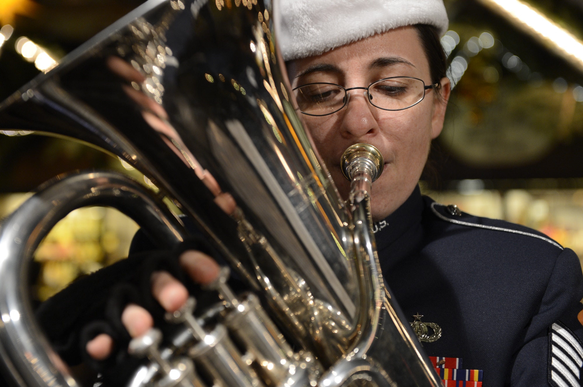 TRIER, Germany — U.S. Air Force Tech. Sgt. Meredith Helay, U.S. Air Forces in Europe Band’s Five Star Brass ensemble euphonium player from Canton, Conn., performs holiday music at a Weihnachtsmarkt Dec. 17, 2013. The USAFE band performed more than 15 German and American holiday classics like O Tannenbaum and We Wish You a Merry Christmas. (U.S. Air Force photo by Staff Sgt. Christopher Ruano/Released)