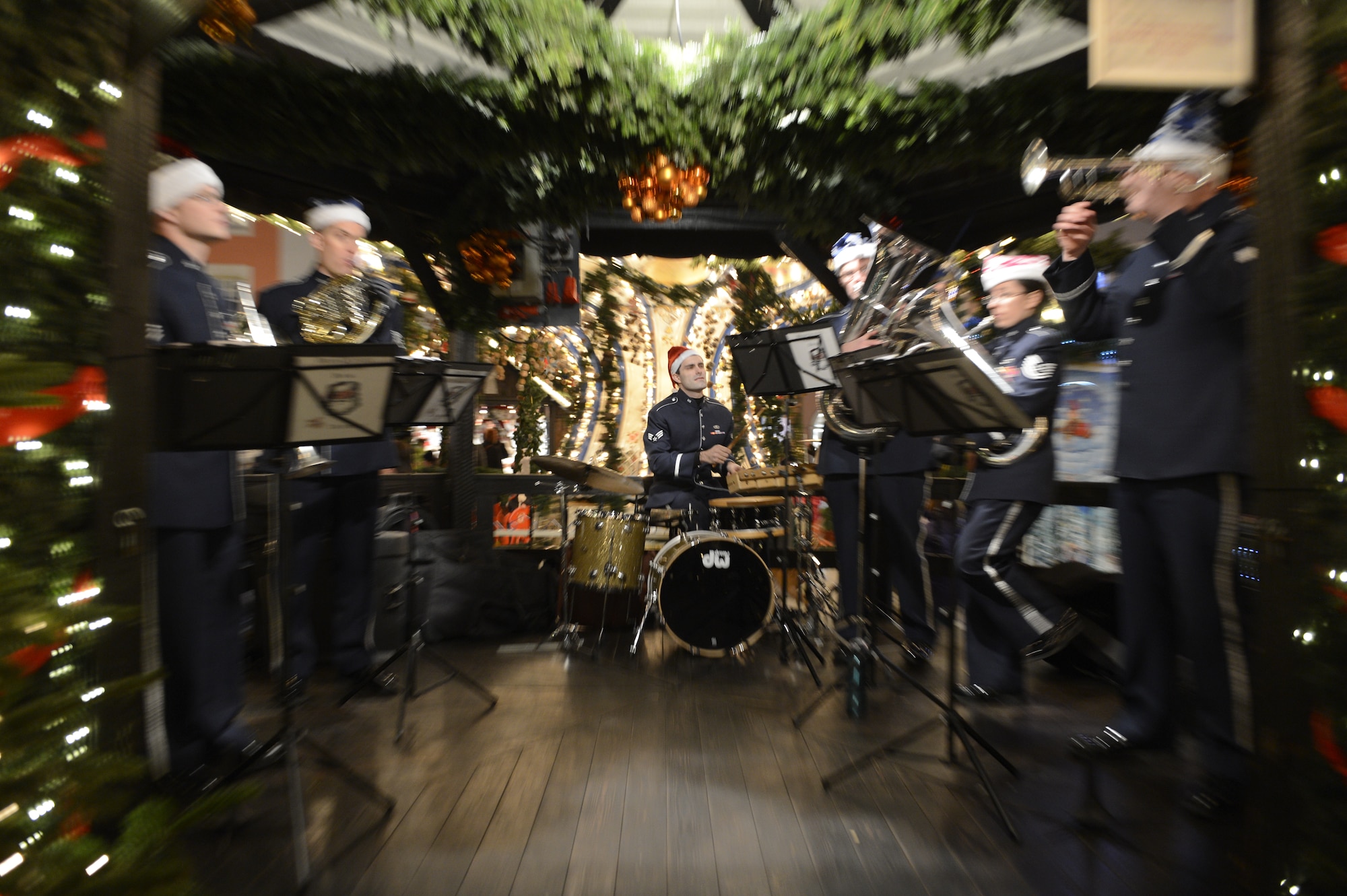 TRIER, Germany — U.S. Air Forces in Europe Band’s Five Star Brass ensemble performs holiday music at a Weihnachtsmarkt Dec. 17, 2013. The Trier Weihnachtsmarkt, or Christmas market, is one of many holiday markets hosted in Germany annually. (U.S. Air Force photo by  Staff Sgt. Christopher Ruano/Released) 