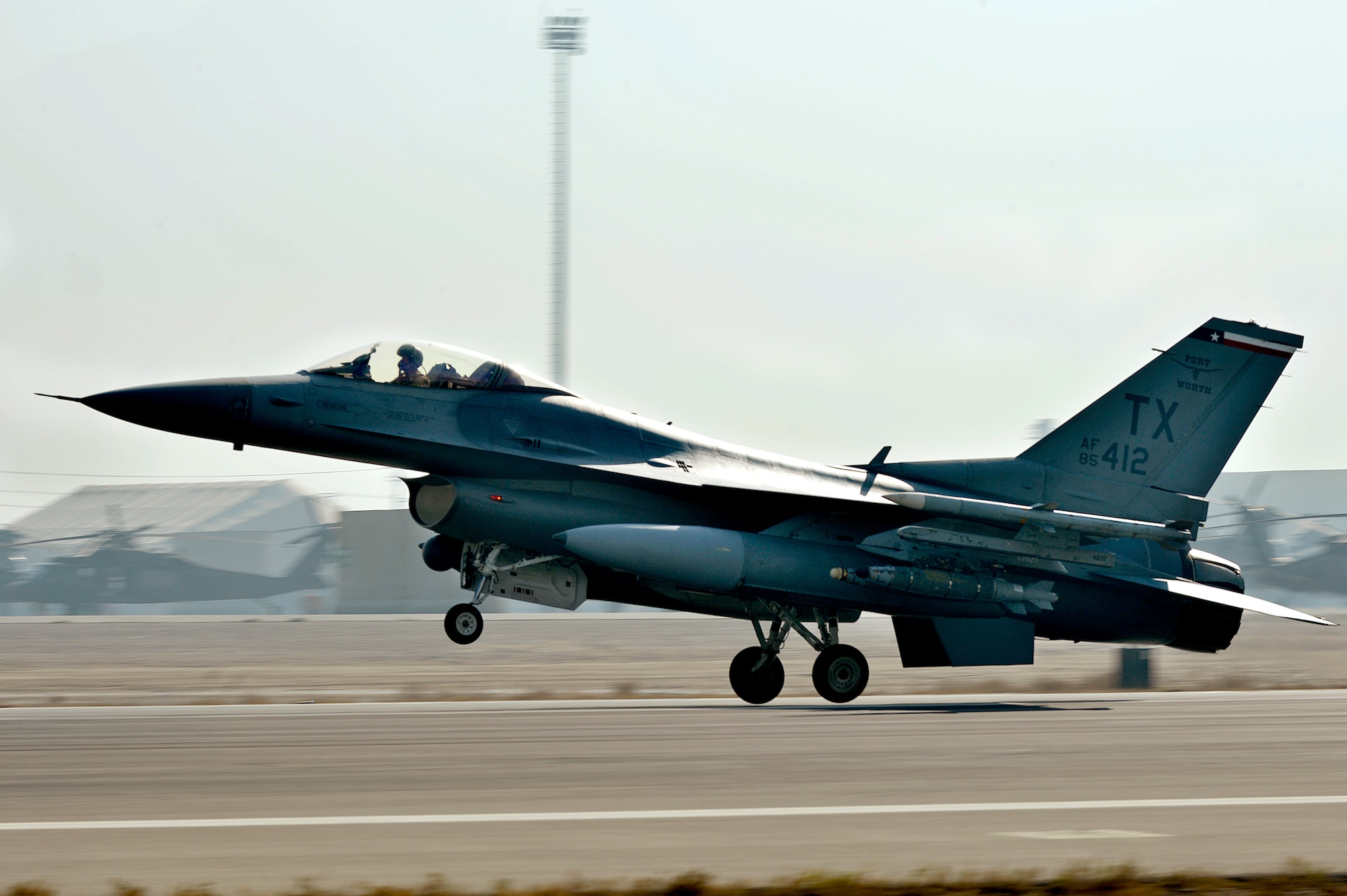 The first of the F-16 Fighting Falcons arrive at Bagram Airfield, Afghanistan, Dec. 15, 2013. The F-16s transitioned from Kandahar Airfield, Afghanistan, to Bagram once the main runway was renovated. (U.S. Air Force photo by Senior Airman Kayla Newman/Released)
