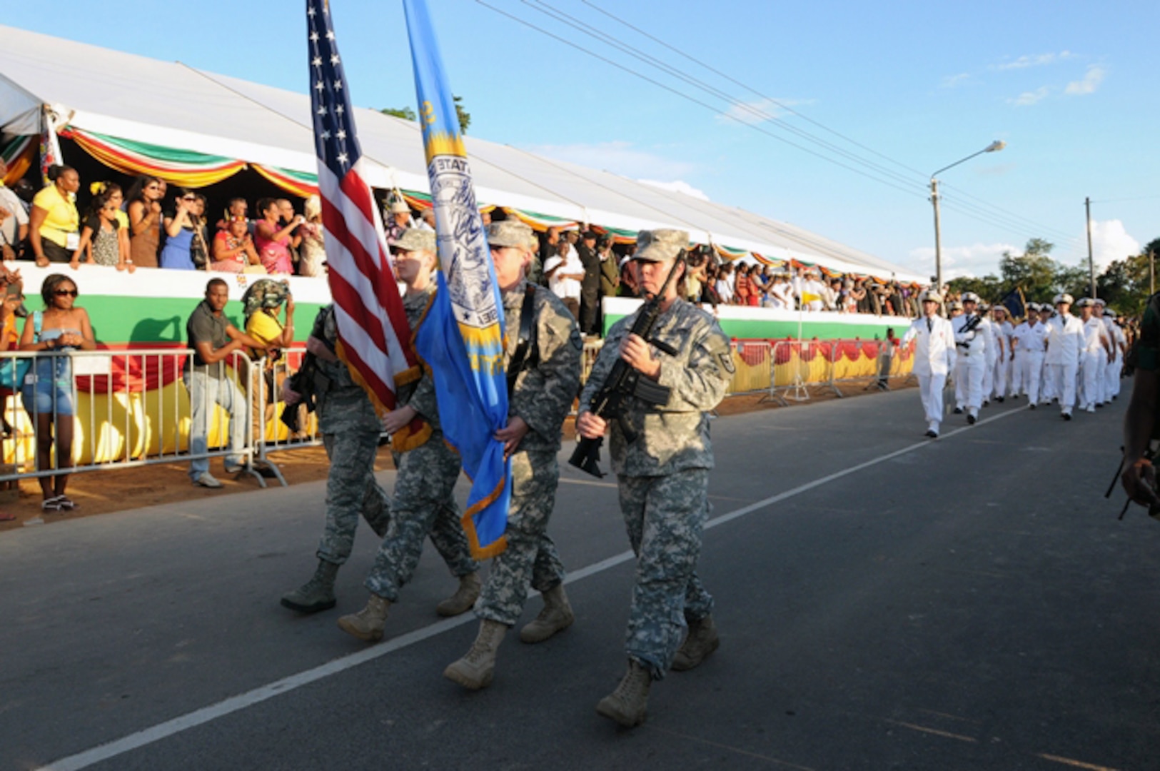 Color guard Soldiers from the South Dakota National Guard participate in a ceremony in Suriname during a State Partnership Program visit in November, 2013.