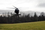 Soldiers from the North Carolina Army National Guard land a UH-60 Black Hawk helicopter at a makeshift landing zone not far from Margarette Falls in Cherokee National Forest while participating in the rescues of a stranded hiker on a 300 foot tall cliff near the falls. The North Carolina Army Guard aircrew worked with members of the North Carolina Emergency Management's Helicopter Aquatic Rescue Team in rescuing the hiker, the fifth collaboration between the North Carolina Army Guard and HART since July.