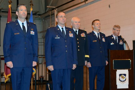 Air Force Maj. Chris Cisneros, far left, and Air Force Lt. Col. Paul C. Zurkowski, left, both A-10C Thunderbolt II pilots with the Maryland Air National Guard's 104th Fighter Squadron, stand at the position of attention during an awards ceremony at Warfield Air National Guard Base, Md., Dec. 8 where they were awarded the Distinguished Flying Cross with Valor for their actions in a fire fight while deployed to Afghanistan.