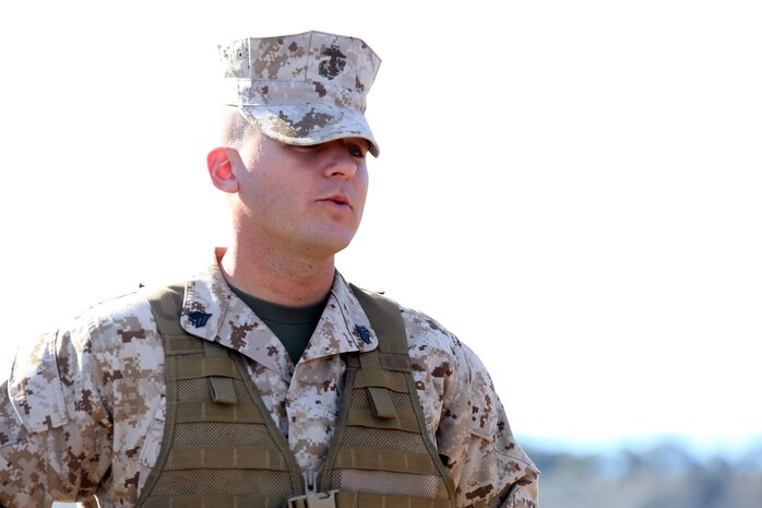 Sgt. Chris L. Smith, senior drill instructor, Platoon 1005, Company A, 1st Recruit Training Battalion, gives instructions to a fire-team during Crucible at Edson Range, Nov. 11. Smith volunteered for drill instructor duty to expand his leadership abilities.