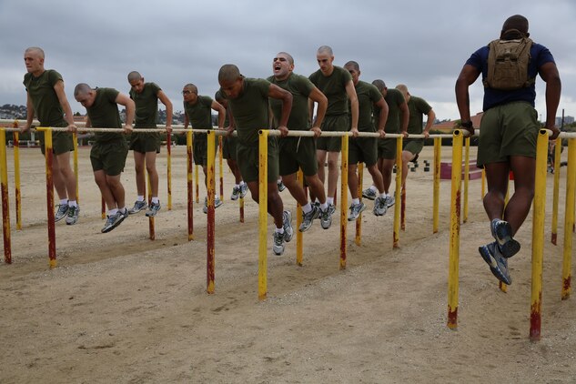Company L recruits workout at the dip bar exercise station Dec. 3. They continuosly performed the exercise until the signal to move to the next station