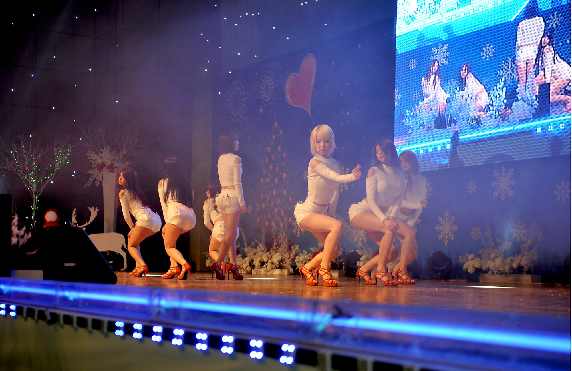 K-pop group AOA performs their song “Elvis” during the 60th Anniversary of the Republic of Korea and U.S. alliance concert at the Ichung Sports Cultural Center in Pyeongtaek-si, ROK, Dec. 18, 2013. Many of the featured guests also sang holiday carols to celebrate the season. (U.S. Air Force photo/Airman 1st Class Ashley J. Thum)