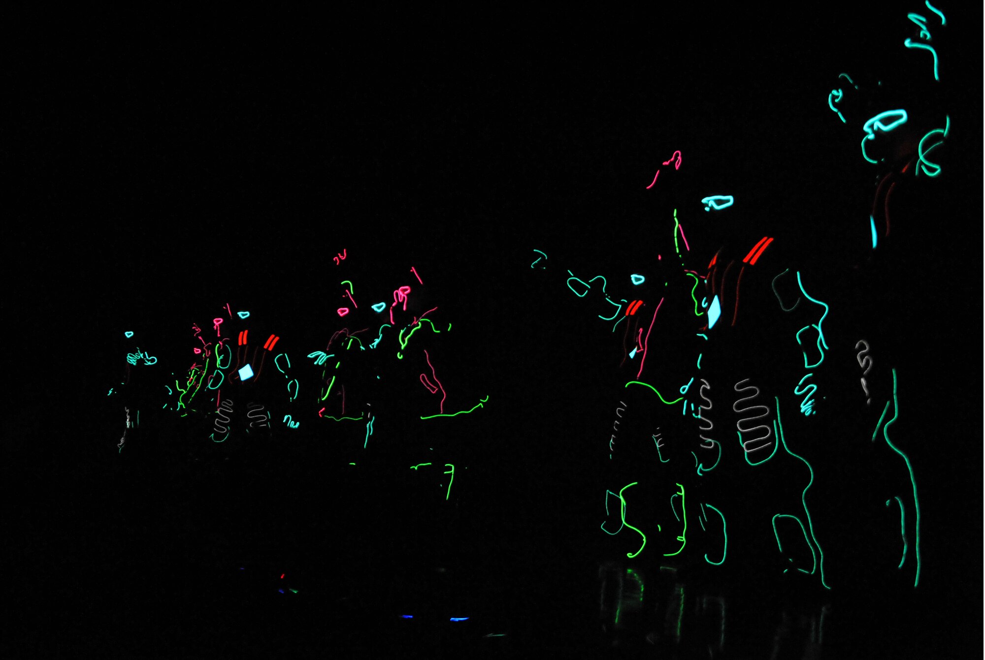 The Saeng-Dong-Gam Crew lights up the stage to the tune of LMFAO’s “Party Rock Anthem” during the 60th Anniversary of the Republic of Korea and U.S. alliance concert at the Ichung Sports Cultural Center in Pyeongtaek-si, ROK, Dec. 18, 2013. The arena was plunged into darkness before the dancers’ specialized LED costumes and intense choreography thrilled audience members. (U.S. Air Force photo/Airman 1st Class Ashley J. Thum)