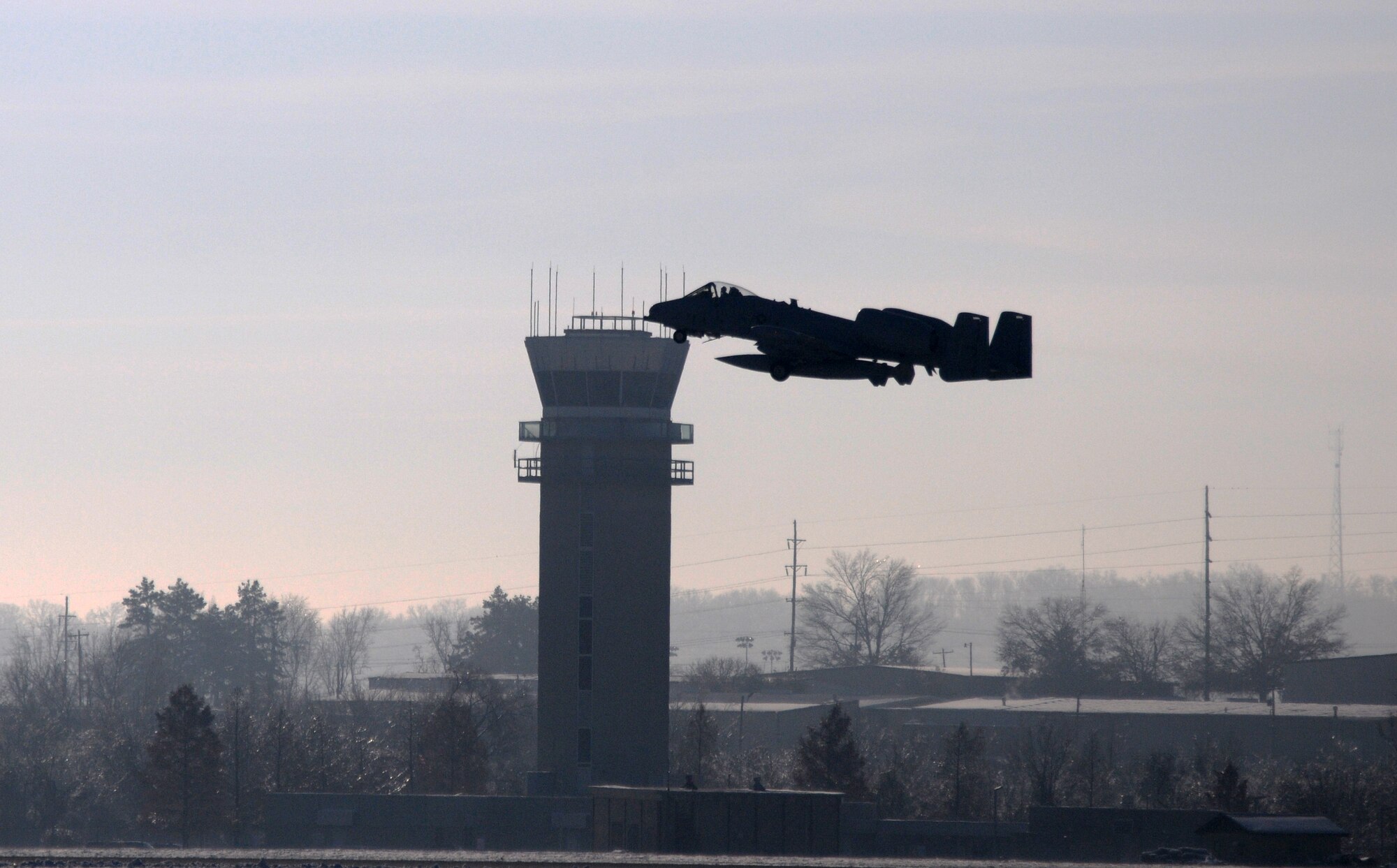 Two A-10C Thunderbolt II "Warthogs" left Fort Smith, Ark., bound for Moody Air Force Base, Ga., Dec. 12, 2013. Tail Nos. 0630 and 0166 departed the 188th Fighter Wing's Ebbing Air National Guard Base as part of the wing’s on-going conversion from a fighter mission to remotely piloted aircraft and Intelligence mission, which will include a space-focused targeting squadron. (U.S. Air National Guard photo by Tech Sgt. Josh Lewis/188th Fighter Wing Public Affairs)