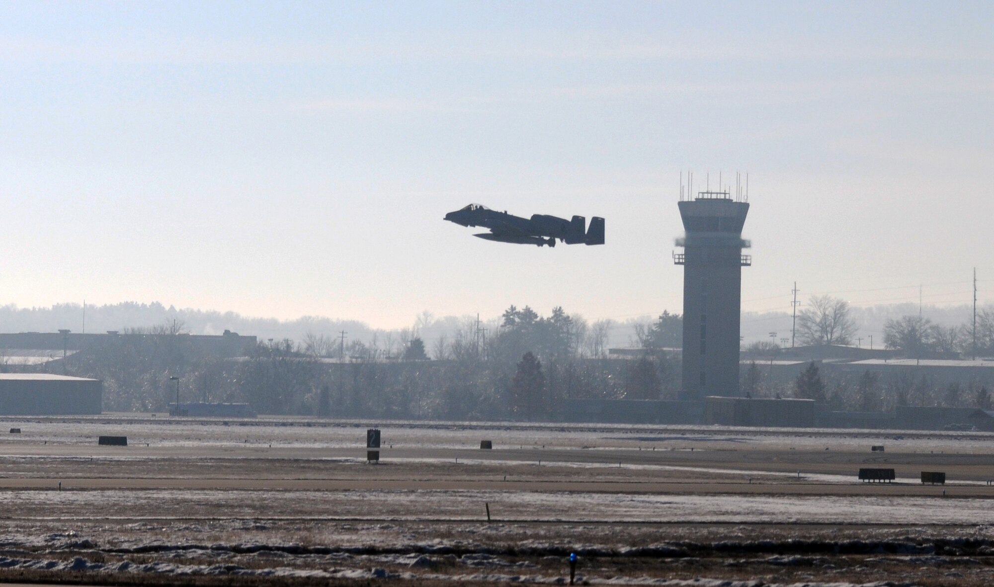 Two A-10C Thunderbolt II "Warthogs" left Fort Smith, Ark., bound for Moody Air Force Base, Ga., Dec. 12, 2013. Tail Nos. 0630 and 0166 departed the 188th Fighter Wing's Ebbing Air National Guard Base as part of the wing’s on-going conversion from a fighter mission to remotely piloted aircraft and Intelligence mission, which will include a space-focused targeting squadron. (U.S. Air National Guard photo by Tech Sgt. Josh Lewis/188th Fighter Wing Public Affairs)