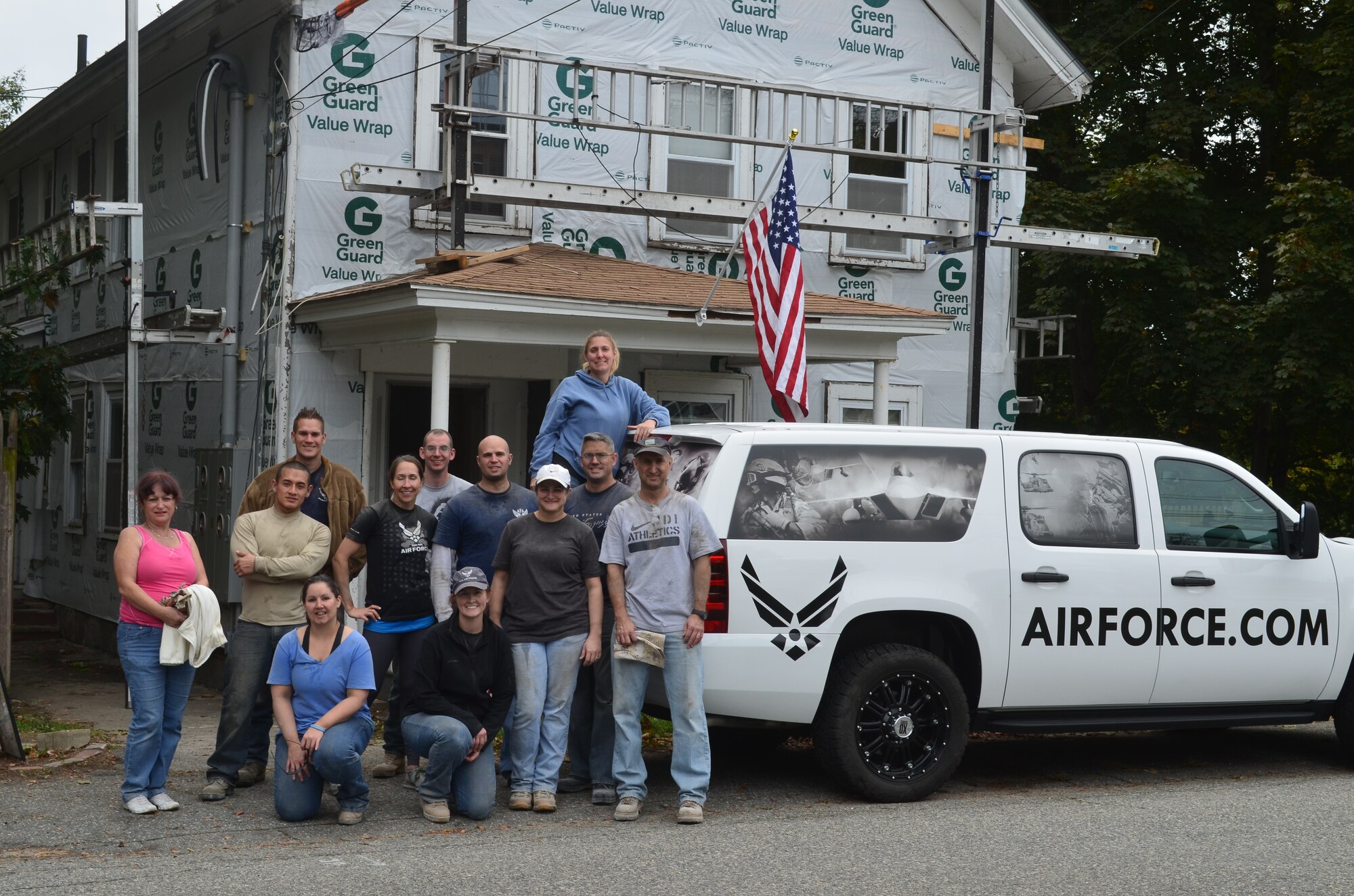 Members of the 319th Recruiting Squadron volunteered for the second time with the renovation of a building that is being converted into a three-family housing unit for veterans in North Andover, Mass. The members of the 319th RCS have been the only volunteers for this project with the Veterans Northeast Outreach Center. Pictured in October are, left to right – Front row: Marybeth Depalo and Staff Sgt. Brianna Nygren (kneeling), and Tech. Sgt. Jessica Mathias and Lt. Col. Anthony Stroup (standing); second row: Sibylle Stroup, Staff Sgt. Byron Larrea, Master Sgt. Melissa Davidson, Tech. Sgt. Chad Hildreth, Master Sgt. John Barber; and back row: Tech. Sgt. Matthew Smith, Staff Sgt. Michael Brothwell and Tech. Sgt. Heather Carriere. (Courtesy photo/Randy Carter, Veterans Northeast Outreach Center)