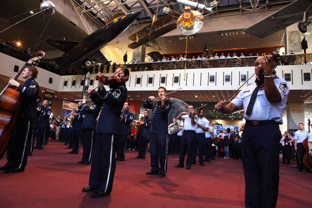 The USAF Band announced the beginning of their Holiday Concerts with a Flash Mob at the Smithsonian's National Air and Space Museum on December 3, 2013.  (U.S. Air Force photo by Master Sgt. Tara Islas/released)