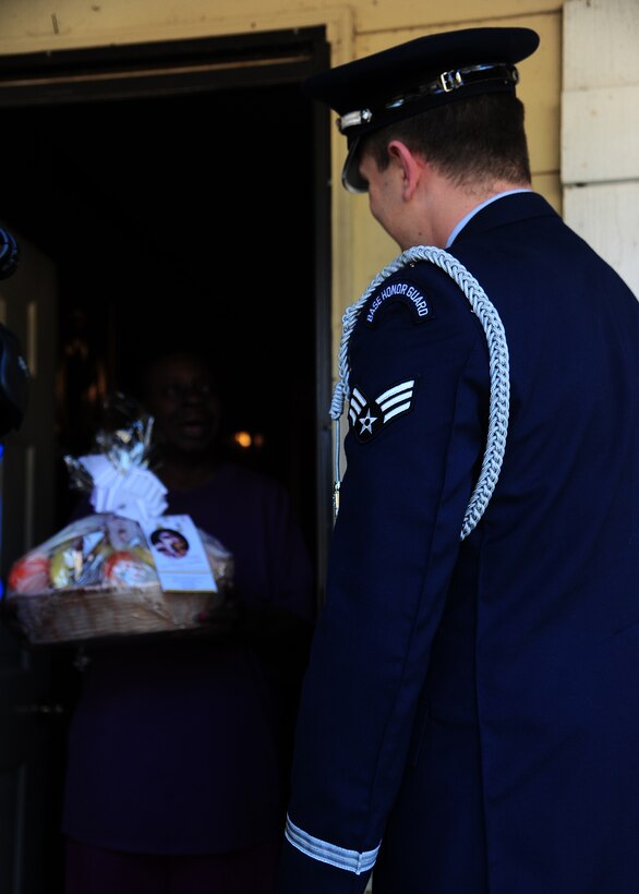 The Columbus Air Force Base Honor Guard delivered fruit baskets to the elderly in Columbus, Miss. Dec. 18 as a volunteer opportunity with the Happy Irby Foundation. The Happy Irby Christmas Fund is a thriving private organization that has benefited thousands of adults and children alike. Yearly, the fund provides clothing and supplies to over 400 children in the local schools and community. In addition, the Happy Fund has delivered over 150 fruit baskets to shut-ins and elderly who would otherwise be alone. In 1996, the Happy Fund became part of the Combined Federal Campaign with 100% of donations used to provide gifts. (U.S. Air Force Photo/Airman 1st Class Daniel Lile)