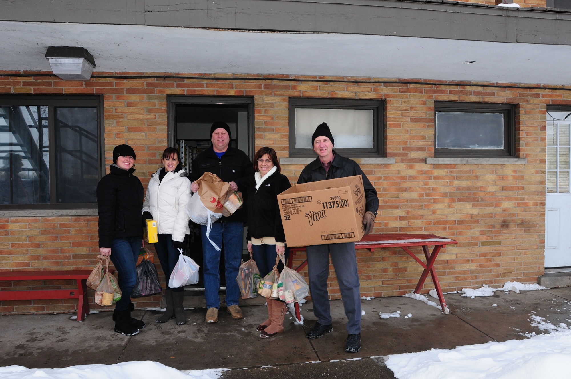 107th Airlift Wing members deliver to Niagara Falls Community Mission. Master Sgt. Melissa Shenefiel, Master Sgt. Chanda White, Master Sgt. Kenneth Devole, Master Sgt. Vicki Weaver and Senior Master Sgt. Steven Buja on Dec. 18, 2013 (New York Air National Guard photo/Senior Master Sgt. Ray Lloyd)