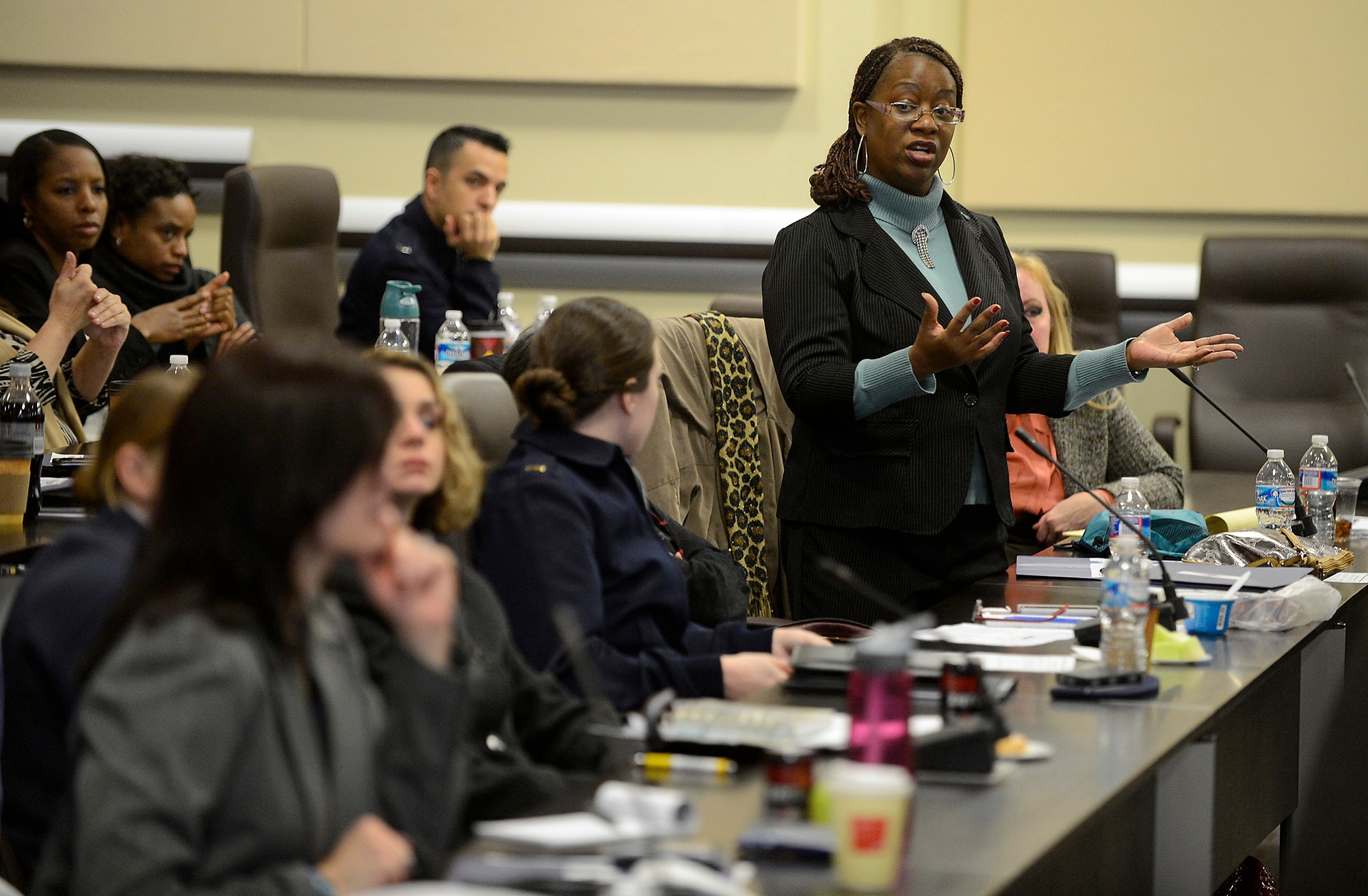 A sexual assault response coordinator asks a question during the Sexual Assault Prevention summit, hosted by Air Force Chief of Staff Gen. Mark A. Welsh III, at Joint Base Andrews, Md., Dec. 12, 2013. Wing commanders, command chiefs and sexual assault response coordinators from across the Air Force attended the two-day event, which included discussion from senior leaders, sexual assault victims and industry experts. 
