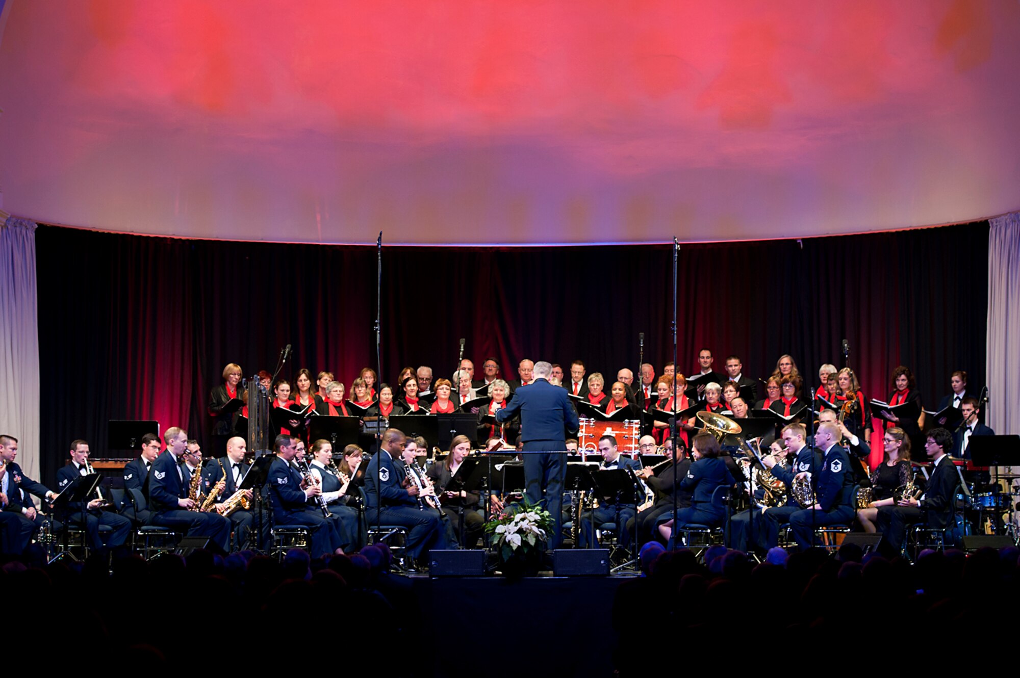 The USAFE Band performs holiday favorites for a crowd of KMC members and German nationals during the KMC Holiday Concert, Dec. 13, 2013. The band teamed up with the Rheinland-Pfalz International Choir to spread holiday cheer to the local community. (U.S. Air Force photo/Senior Airman Damon Kasberg)