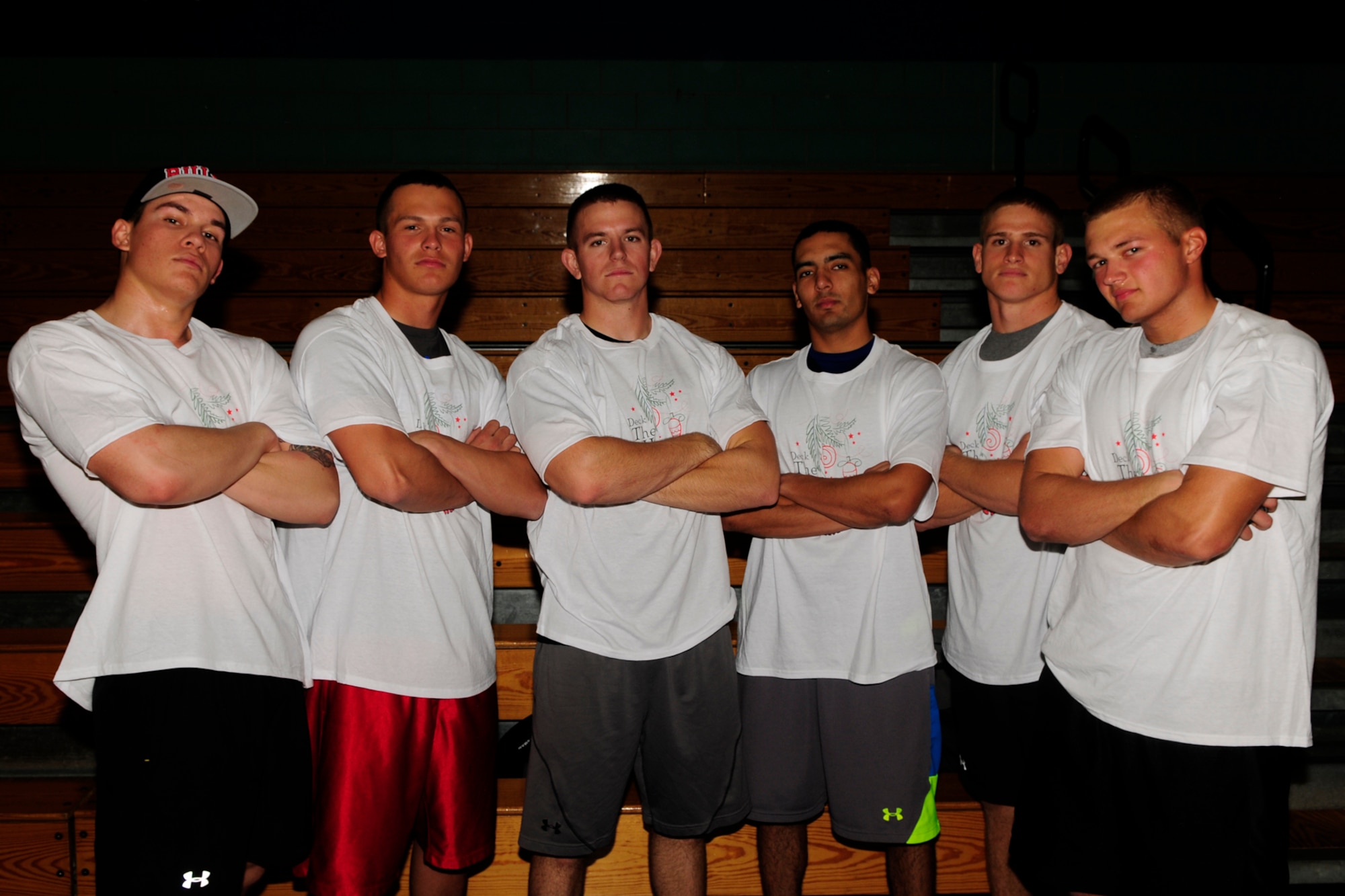 GOODFELLOW AIR FORCE BASE, Texas - 312th Training Squadron students pose for a group photo at Mathis Fitness Center Dec. 14 after winning the Deck the Halls with Dodgeballs tournament.  The event was a chance for students in a joint service training environment to take pride in their service, and build camaraderie with the sister services.   (U.S. Air Force photo/ Airman 1st Class Devin Boyer)


