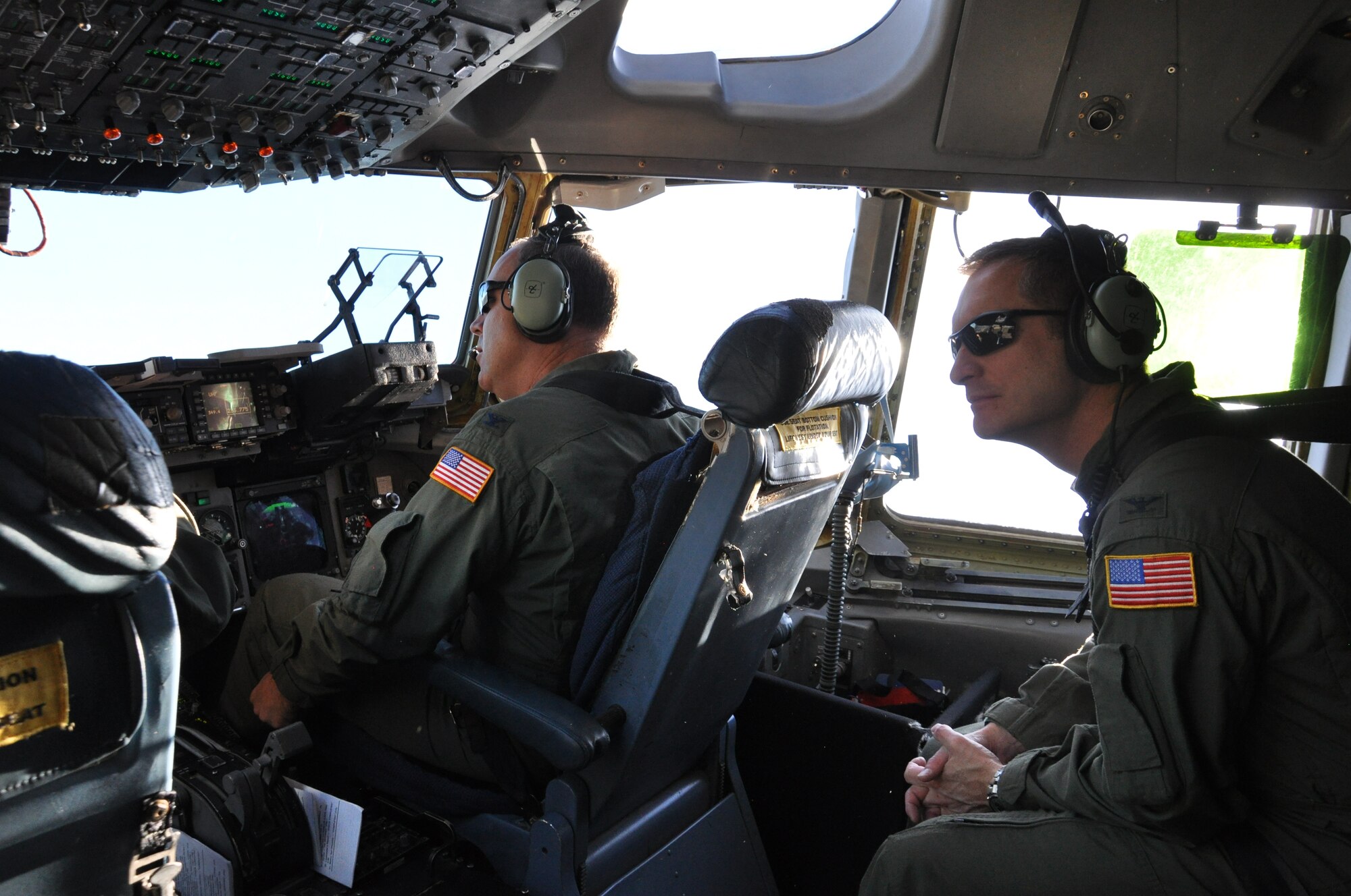 Col. James Fontanella, 315th Airlift commander, on the flight deck of "The Spirit of Charleston" as thejet passed the 20,000 flight hours mark this week.  (U.S. Air Force Reserve photo by Senior Airman Meredith Thomas)