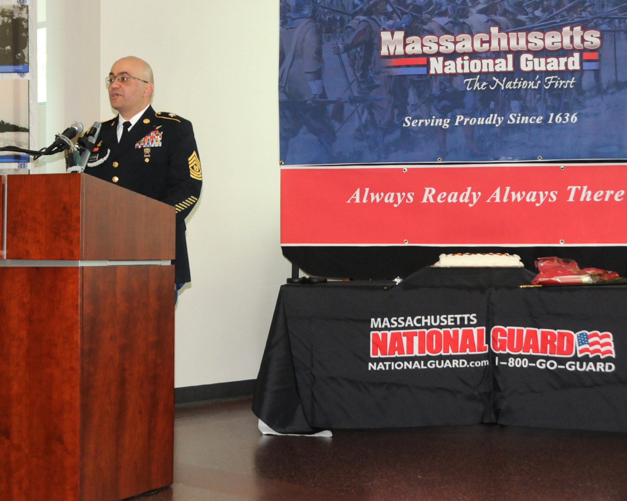 In-coming State Command Sgt. Maj. Carlos Ramos Rivera delivers remarks during a Change of Responsibility ceremony at Joint Force Headquarters here Dec. 13. Ramos Rivera assumed the position of State Command Sergeant Major from Out-going State Command Sgt. Maj. David Costa during the ceremony. (U.S. Army National Guard photo by Sgt. Doug Huddy, Massachusetts National Guard Public Affairs/Released)