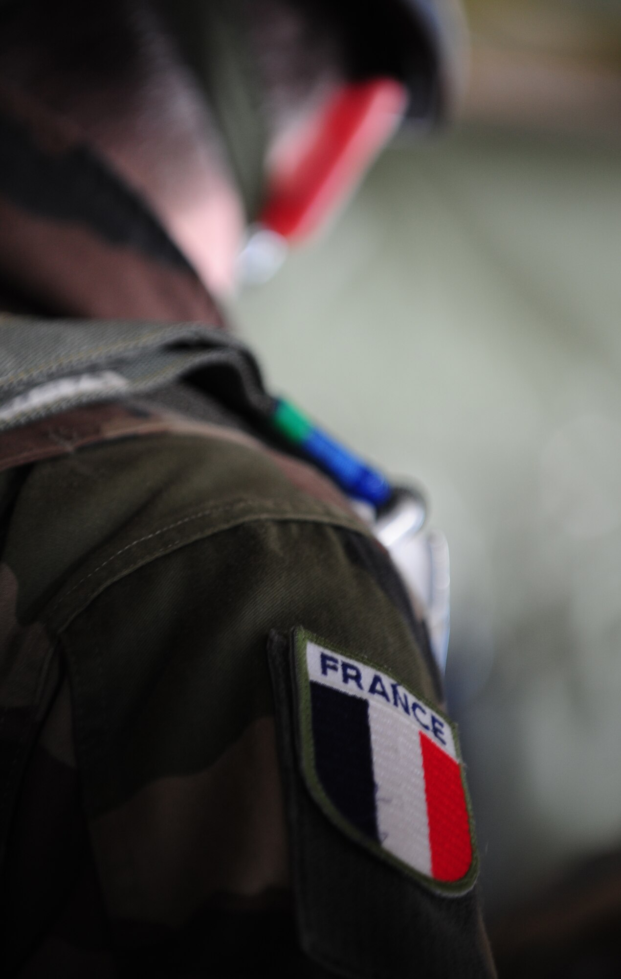A French paratrooper prepares to take the plunge and jump out of a C-130J Super Hercules during International Jump Week, Dec. 17, 2013, Ramstein Air Base, Germany. With several different countries involved in Jump Week, it was a chance for everyone to get together and build partnerships. (U.S. Air Force photo/Senior Airman Hailey Haux)