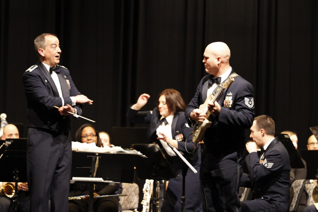 The USAFE Concert Band performs a holiday program for the community of Kelkheim, Germany.  TSgt Jason Cale during a rockin' version of "Laughing all the Way."
