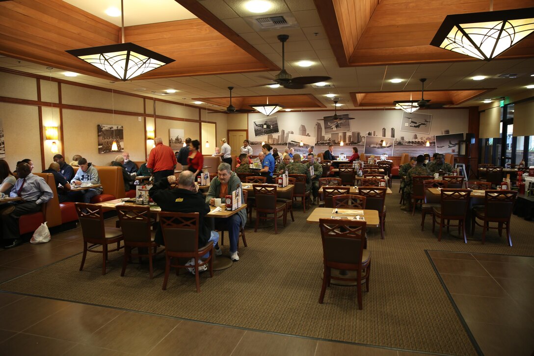 Service members, families and friends come to the opening of a new Denny’s aboard Marine Corps Air Station Miramar, Calif., Dec. 19. The restaurant became a new addition to the facilities near the Staff Non-Comissioned Officers’ Club, The Rockers, on the installation. 