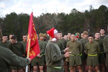 Navy Capt. Michael Sokolowski, the commanding officer of 2nd Medical Battalion, Combat Logistics Regiment 25, 2nd Marine Logistics Group speaks to service members after a reindeer run aboard Camp Lejeune, N.C., Dec. 20, 2013. Sokolowski thanked the Marines and sailors with the battalion, and encouraged them to take care of their shipmates over the upcoming holidays. (U.S. Marine Corps photo by Lance Cpl. Shawn Valosin)