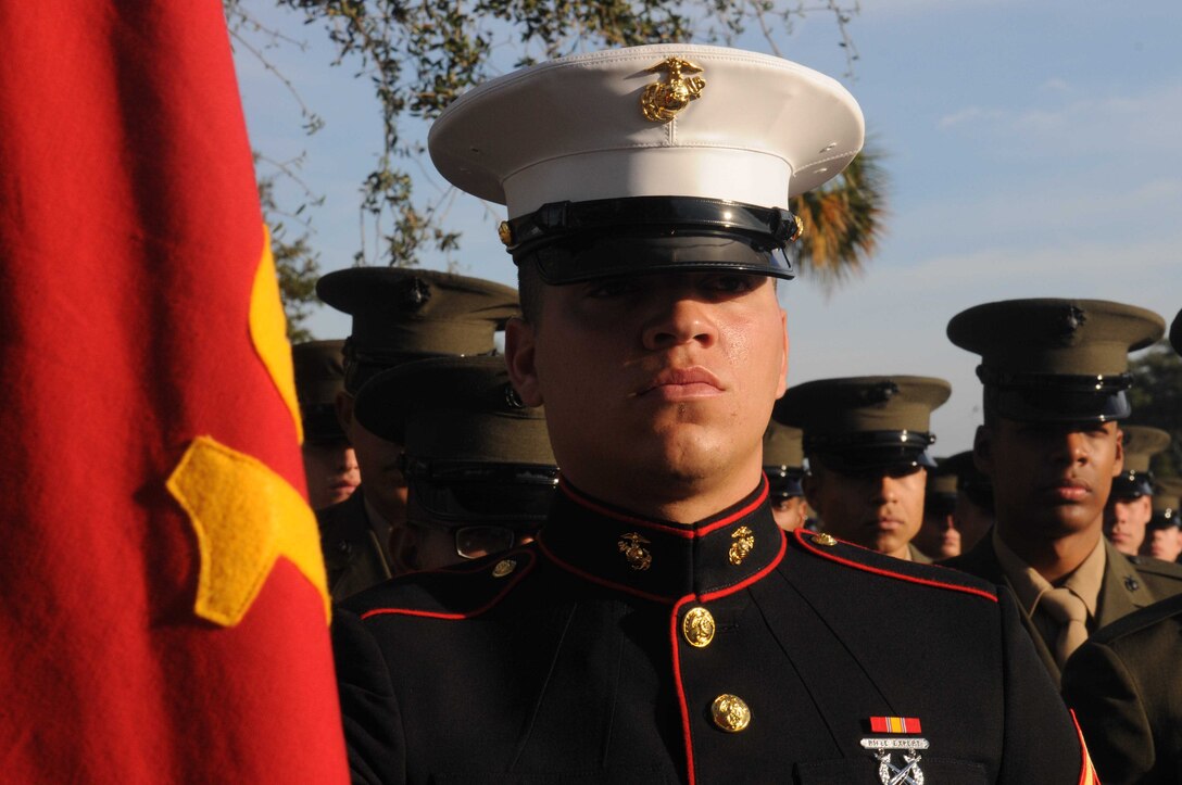 PARRIS ISLAND, S.C. - Pfc. Khalid A. Rahman, honor graduate for platoon 1098, stands at parade rest before graduation here, Dec. 20, 2013. Rahman, a native of Lexington, Tenn. was recruited by Staff Sgt. Scottie D. Carter, a recruiter from Recruiting Station Nashville. Rahman will be able to enjoy some much deserved leave with his family as he prepares for Marine combat training in Camp Geiger, N.C. (U.S. Marine Corps photo by Lance Cpl. Stanley Cao)
