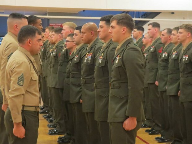 1/2 Marines from 6th Marine Regiment 2nd Marine Division receive their Fourragere. 