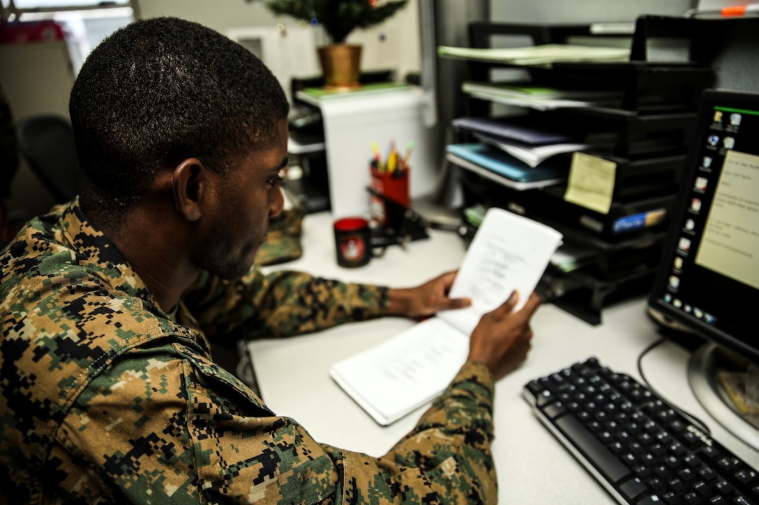 Petty Officer 3rd Class Rylan Burchell, hospital corpsman, 15th Marine Expeditionary Unit, reviews Marine Corps History aboard Camp Pendleton, Calif., Dec. 19. Marine Corps history is a part of the Enlisted Fleet Marine Force Specialist exam. Burchell, 25, is from Kingston, Jamaica. (U.S. Marine Corps photo by Cpl. Emmanuel Ramos)