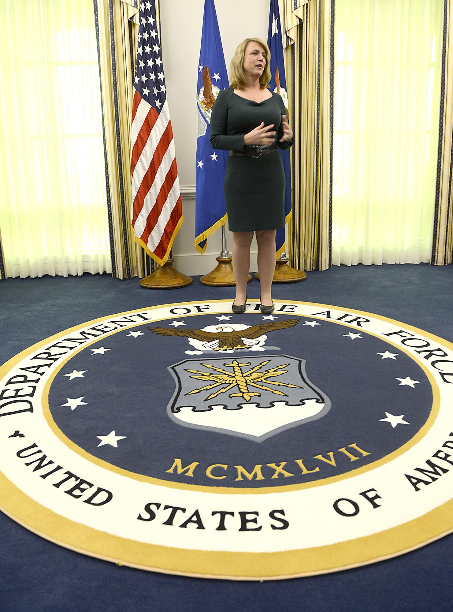 Secretary of the Air Force Deborah Lee James thanks her team following swearing into her new role as the 23rd Air Force secretary Dec. 20, 2013, in the Pentagon. James is responsible for the affairs of the Department of the Air Force, including the organizing, training, equipping and providing for the welfare of its more than 690,000 active duty, Guard, Reserve and civilian Airmen and their families. (U.S. Air Force photo/Scott M. Ash) 