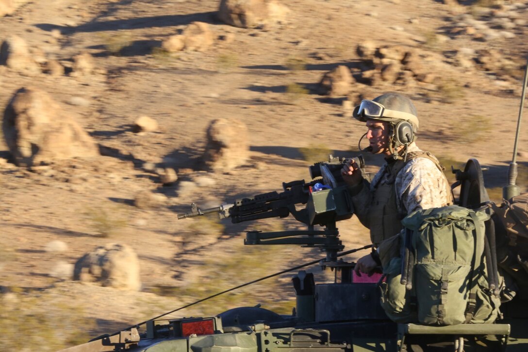 Sergeant Wesley Adams, vehicle commander, Delta Company, 1st Light Armored Reconnaissance Battalion, and a native of Atlanta, supports Exercise Steel Knight 2014 in his light armored vehicle at Marine Corps Air Ground Combat Center Twentynine Palms, Calif., Dec. 14, 2013. Adams joined the Marine Corps after high school because of his pride in his country and his willingness to sacrifice everything for his loved ones. He earned his billet as vehicle commander 10 months ago and plans on making a career out of the Marine Corps

Read more: http://www.dvidshub.net/image/1141822/atlanta-marine-joins-pride-country#.UrTB6fRDvng#ixzz2o3XZje7C