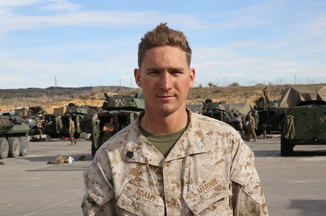 Sergeant Wesley Adams, vehicle commander, Delta Company, 1st Light Armored Reconnaissance Battalion, and a native of Atlanta, supports Exercise Steel Knight 2014 in his light armored vehicle at Marine Corps Air Ground Combat Center Twentynine Palms, Calif. Adams joined the Marine Corps after high school because of his pride in his country and his willingness to sacrifice everything for his loved ones. He earned his billet as vehicle commander 10 months ago and plans on making a career out of the Marine Corps.