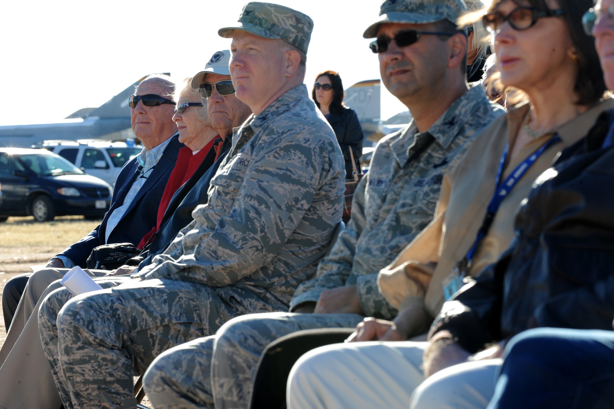 Retired U.S. Air Force General Earl O'Loughlin, left, watches as a B-52G is cut into pieces at the 309th Aerospace Maintenance and Regeneration Group, Davis-Monthan Air Force Base, Ariz., Dec. 19, 2013. O'Loughlin was a B-25 Instructor pilot from 1965 -1968 for the 379th  Bombardment Wing at Wurtsmith Air Force Base, Mich., which is now decommissioned. (U.S Air Force photo by Staff Sgt. Angela Ruiz/released)