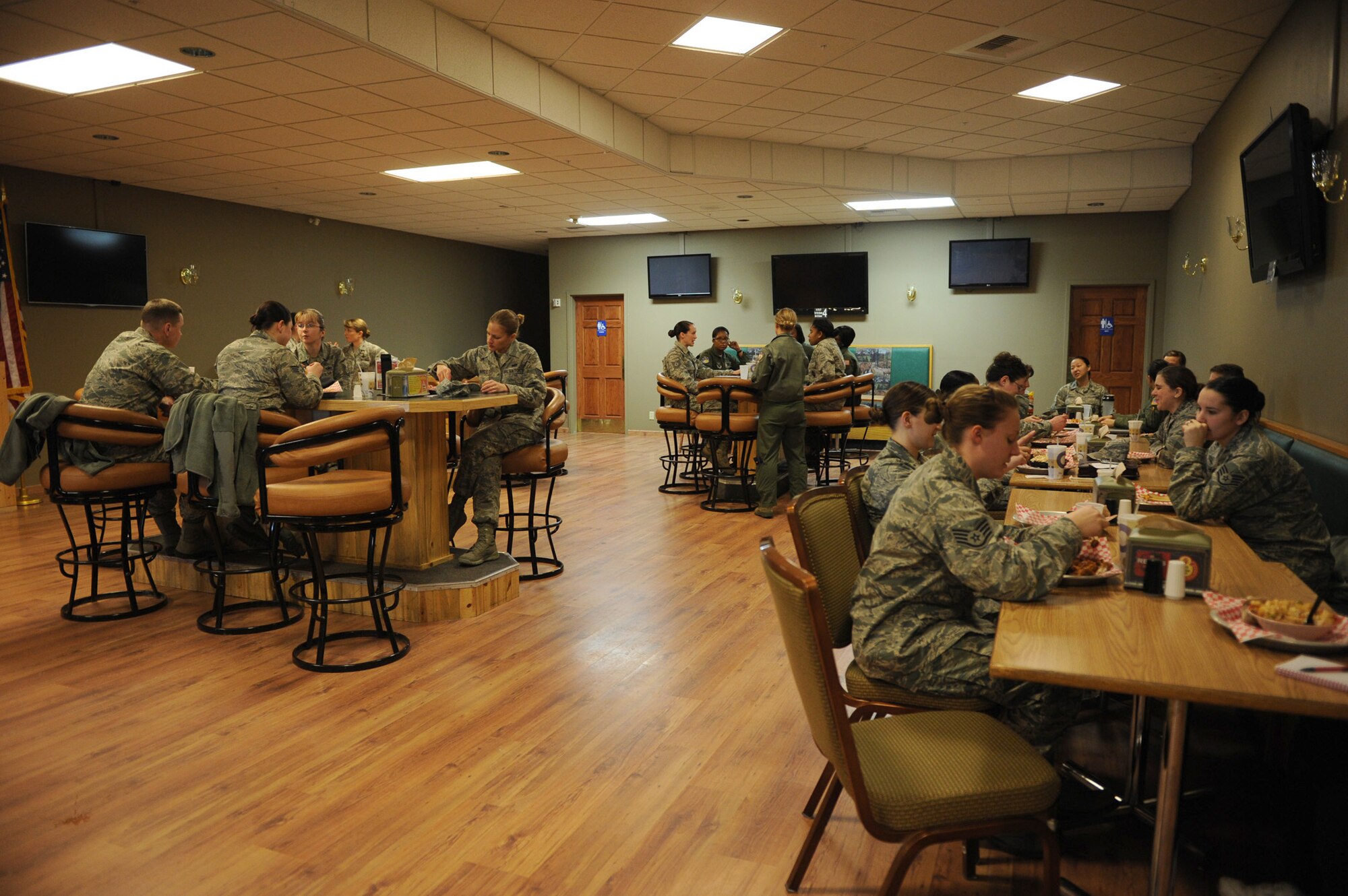 More than 50 Team Malmstrom members attend a luncheon at Aces High Bowling Center to celebrate the Year of the Military Women on Dec. 16. The Navy Memorial Foundation, a non-profit educational foundation, celebrates YOMW, which pays special tribute to women in all branches of the military and is a yearlong exhibit and series of events held both at the memorial’s Naval Heritage Center and nationwide throughout the Department of Defense. (U.S. Air Force photo/Senior Airman Katrina Heikkinen)