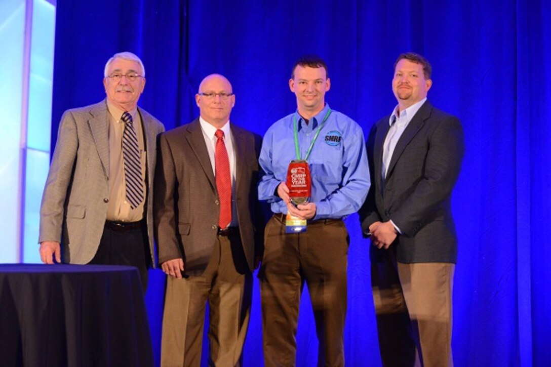 Certified Maintenance and Reliability Professional (CMRP) of the Year winner Christopher Mears (3rd from left) accepts his award from (l-r) Butch DiMezzo, Larry Hoing and Shon Isenhour at the Society for Maintenance and Reliability Professionals (SMRP) Annual Conference. (Photo provided)