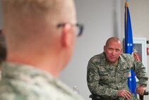 Chief Master Sgt. Brian Hornback, Air Force Global Strike Command command chief, talks with young Airmen at the First Term Airmen Center on F.E. Warren Air Force Base, Wyo., Dec. 17, 2013. Hornback visited with 90th Missile Wing Airmen inquiring about their concerns. (U.S. Air Force photo by R.J. Oriez)