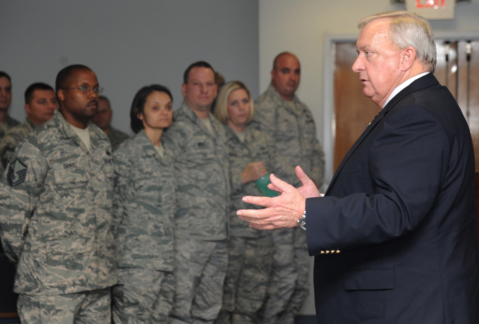 Retired Chief Master Sgt. Jim Binnicker, the ninth Chief Master Sergeant of the Air Force, speaks to members of the Top-III Dec. 19, 2013, at the Sablich Center, Keesler Air Force Base, Miss.  Binnicker’s one-day visit to Keesler also included being the guest speaker at the MNCOA graduation and speaking to other various military groups on base.  (U.S. Air Force photo by Kemberly Groue)