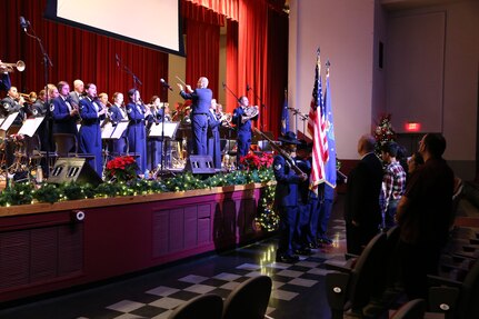 The Air Force Band of the West plays the Star Spangled Banner while military training instructors present the colors Dec. 17 at the Joint Base San Antonio-Lackland Bob Hope Theater. (U.S. Air Force photo by Airman 1st Class Lincoln Korver)