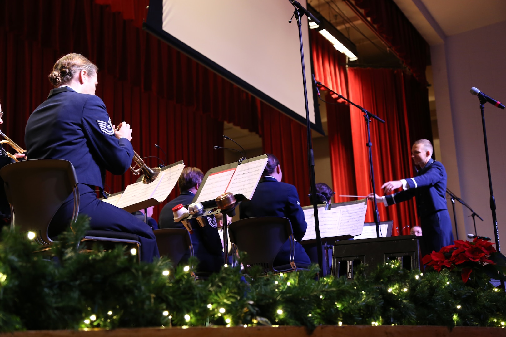 The Air Force Band of the West plays a variety of holiday songs Dec. 17 at the Joint Base San Antonio-Lackland Bob Hope Theater. (U.S. Air Force photo by Airman 1st Class Lincoln Korver)
