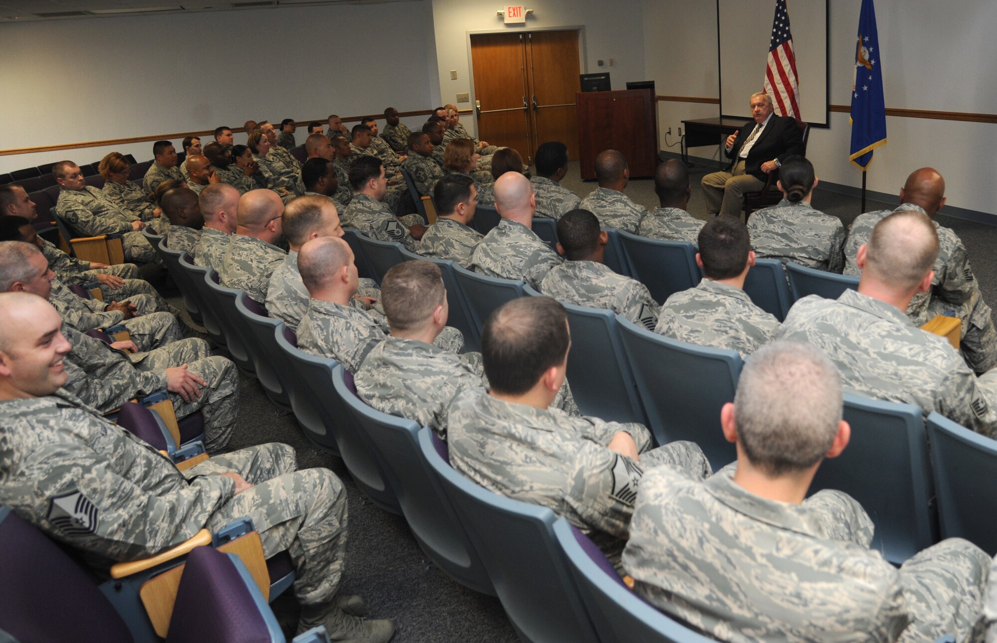 Retired Chief Master Sgt. Jim Binnicker, the ninth Chief Master Sergeant of the Air Force, speaks to members of the Top-III Dec. 19, 2013, at the Sablich Center, Keesler Air Force Base, Miss.  Binnicker’s one-day visit to Keesler also included being the guest speaker at the MNCOA graduation and speaking to other various military groups on base.  (U.S. Air Force photo by Kemberly Groue)