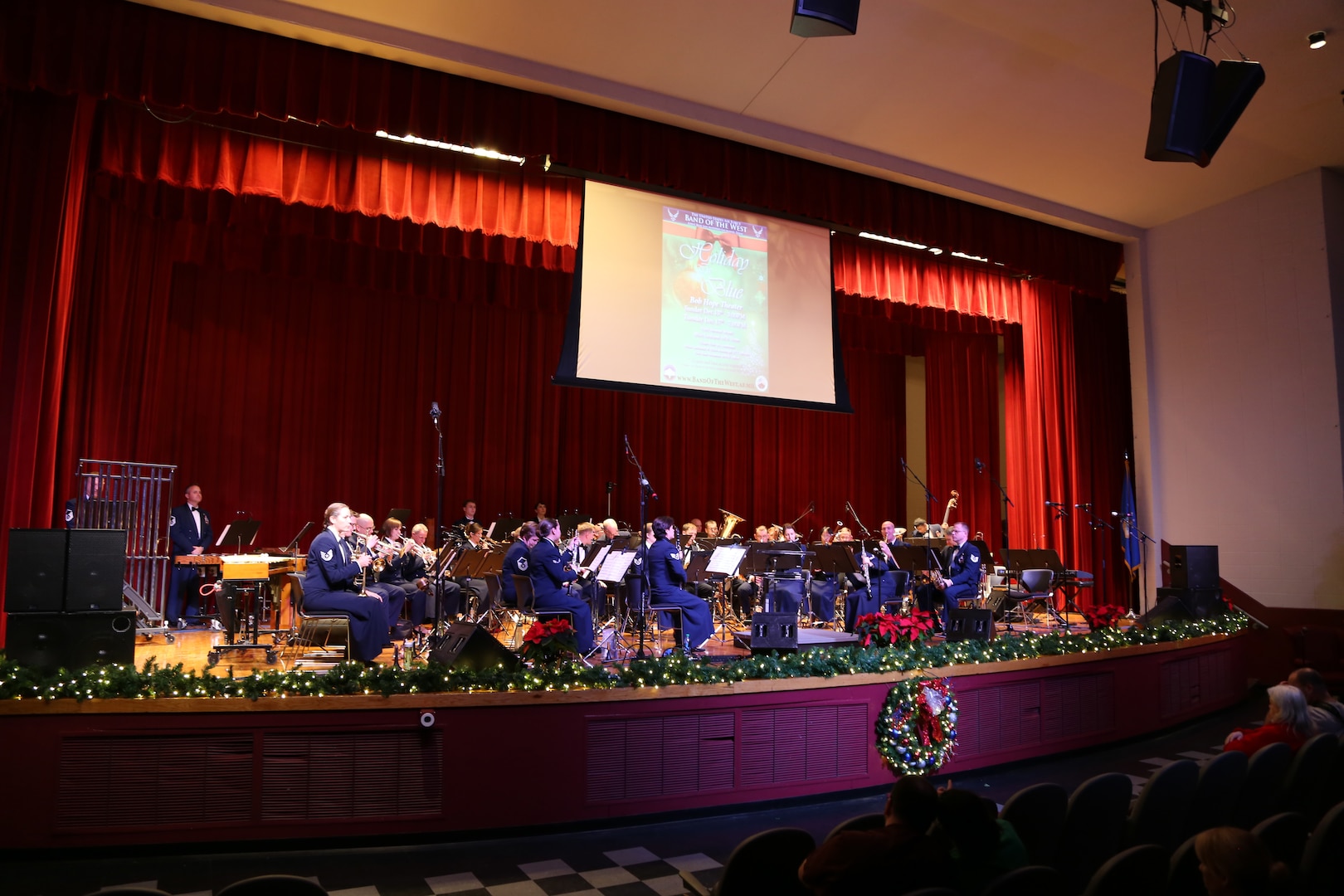 The Air Force Band of the West plays a variety of holiday songs Dec. 17 at the Joint Base San Antonio-Lackland Bob Hope Theater. (U.S. Air Force photo by Airman 1st Class Lincoln Korver)