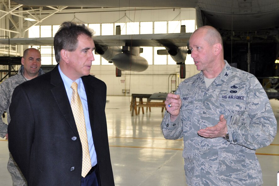 YOUNGSTOWN AIR RESERVE STATION, Ohio – After a walkthrough of the YARS lodging facilities and a windshield tour of the installation, the congressman’s tour continued on to the wing’s maintenance areas. Air Force Reserve Col. David Post (right), commander of the 910th  Maintenance Group, based here, talks with Congressman Jim Renacci (middle) of Ohio’s 16th district about aircraft maintenance operations in a hangar here, Dec. 19, 2013, while Col. James Dignan (left), commander of the 910th Airlift Wing looks on. The congressman visited YARS to learn more about the wing’s capabilities and the installation’s features firsthand as well as meet some of the Citizen Airmen assigned here. U.S. Air Force photos by Master Sgt. Bob Barko Jr.