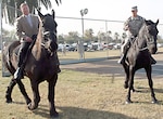 Kenneth O. Preston (left), former sergeant major of the Army, and Command Sgt. Maj. Hu Rhodes ride Preston and Van Autreve, respectively, back to the Fort Sam Houston stables Dec. 12 following the official naming ceremony for Preston. Rhodes is senior Army enlisted leader for U.S. Army North, Joint Base San Antonio-Fort Sam Houston and JBSA-Camp Bullis. (Army Photo by Staff Sgt. Corey Baltos, U.S. Army North Public Affairs)