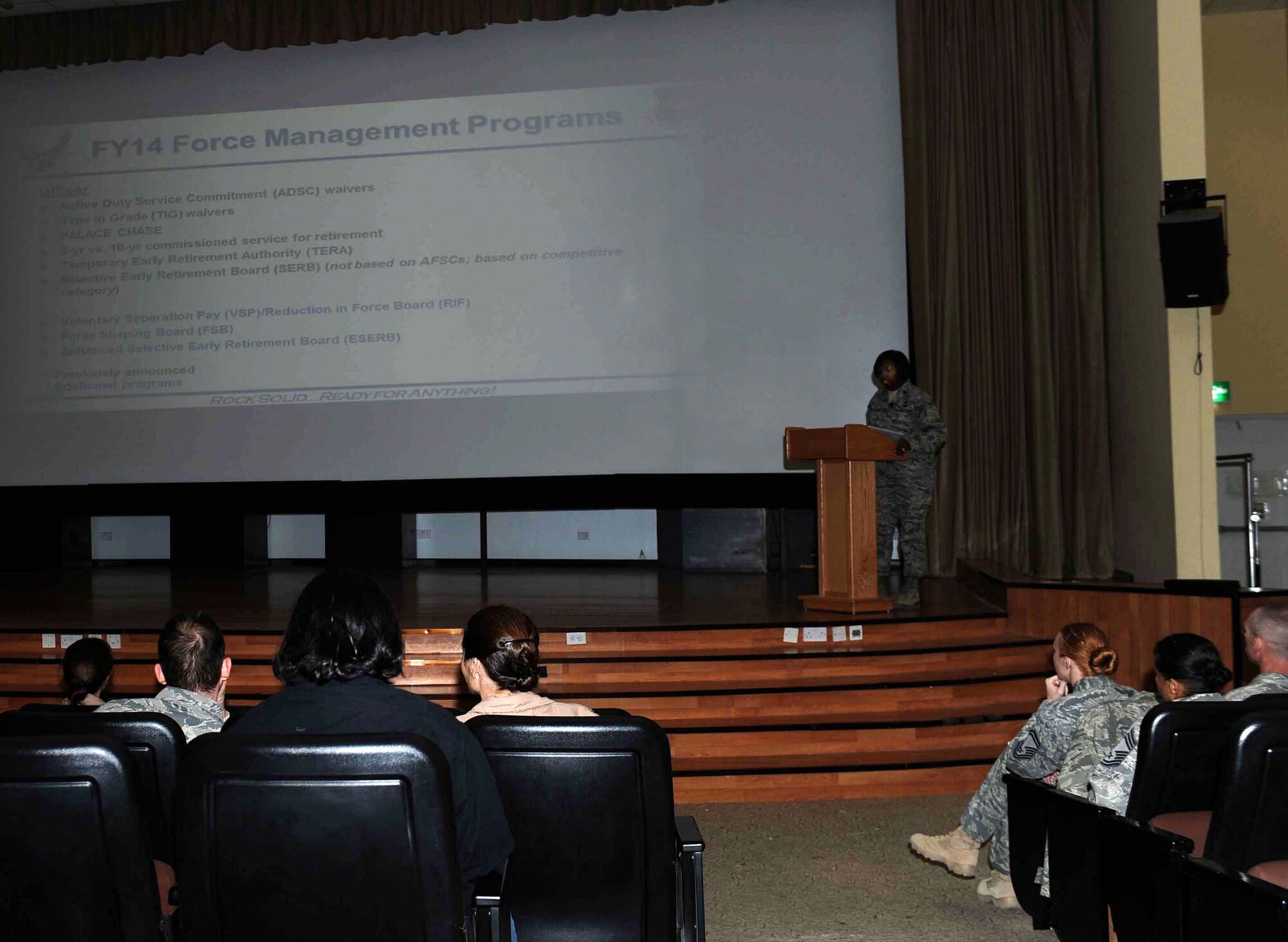 Lt. Col. Cotina Jenkin Sellers Force Support commander, addresses 386th Air Expeditionary Wing members during a force management town hall meeting, undisclosed location Southwest Asia. Members were inform about new fiscal year force management programs available to them. (U.S. Air Force photo by Senior Airman Desiree W. Moye)