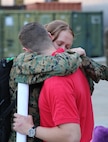 Marines with Marine Light Attack Helicopter Squadron (HMLA) 167 return home to awaiting families and friends at the squadron’s hangar aboard Marine Corps Air Station New River, Dec. 5. The Marines were deployed for more than three months to Okinawa, Japan, as part of the Unit Deployment Program.
